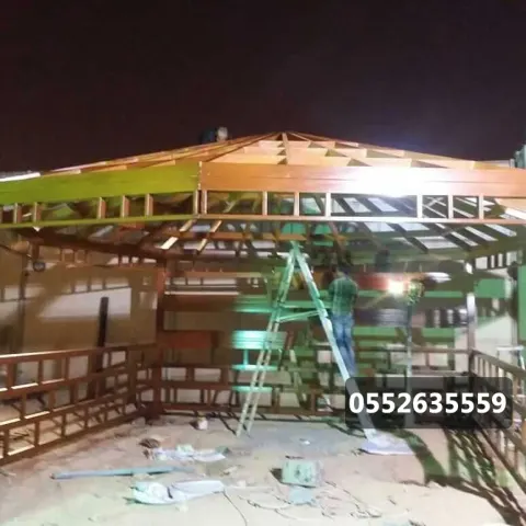 نموذج من أعمال شركة مظلات خشبية للحدائق